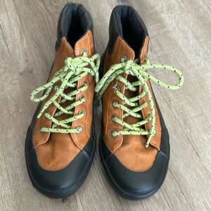 Brown and black with lime green laces. Old navy high tops size 2